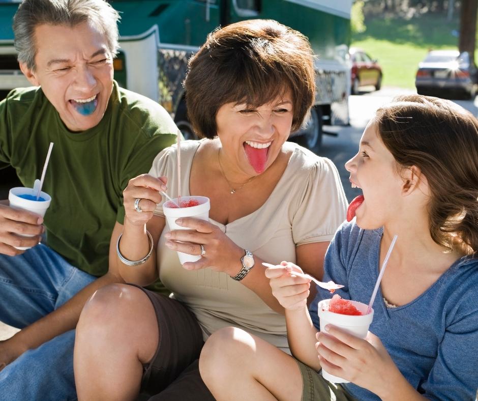 family enjoying snow cones